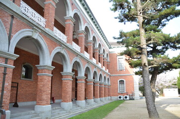 Naklejka premium The centuries-old Itsukushima Shrine (厳島神社, Itsukushima Jinja) on Miyajima is the source of both the island's fame and its name. 