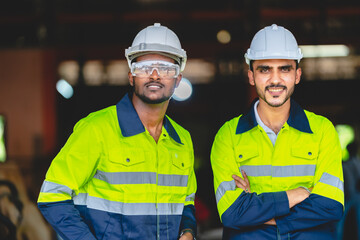 professional business industry technician wearing safety helmet working to maintenance service and checking factory equipment, a work of engineer occupation in manufacturing construction technology