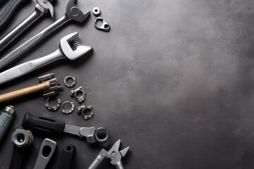 Auto mechanic's tools on grey stone table with copy space