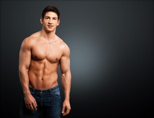 Fototapeta premium Hot muscular man model on dark background.