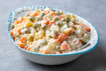 Russian salad Olivier with mayonnaise and egg served (Turkish name; Rus salatasi)