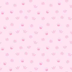 Seamless pattern with crowns on a light pink background in doodle style.