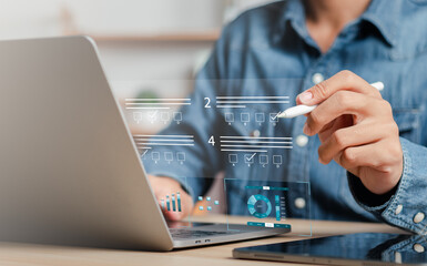 Business planning concept. Businessman filling out business economic analysis form.