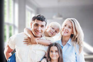 Cheerful little child playing with family