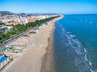 Fototapeta na wymiar Aerial view landscape Italy Pescara. Long empty beach, sand, sea. Coast, promenade, buildings, estate.