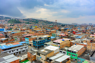 panoramic overview of a shanty town in the district ciudad bolivar in bogota, colombia