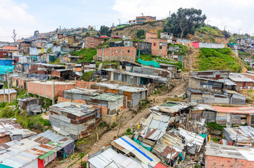 panoramic overview of a shanty town in the district ciudad bolivar in bogota, colombia - obrazy, fototapety, plakaty