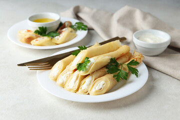 Concept of tasty food, thin pancakes with filling