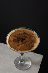 Espresso martini cocktail, delicious alcohol drink, space for text