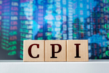 CPI - acronym from wooden blocks with letters, Consumer Price Index. Financial market concept