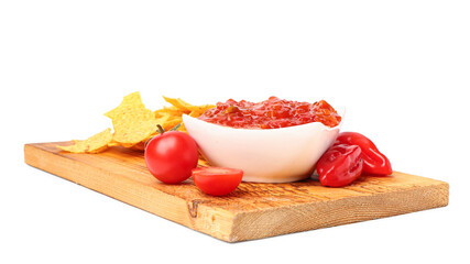 Board with bowl of delicious salsa, nachos and ingredients isolated on white background