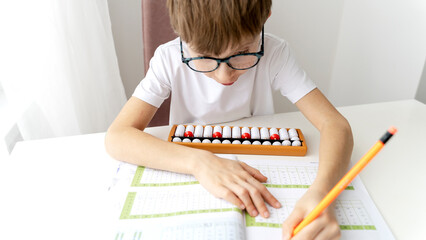 the student is engaged in mental arithmetic on the abacus