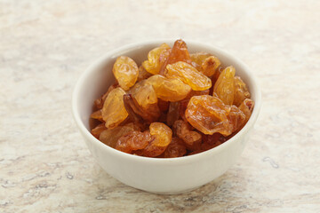 Sweet yellow raisin in the bowl