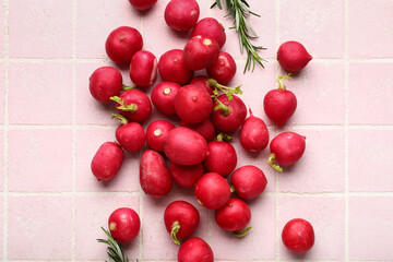 Heap of fresh radish on pink tile background