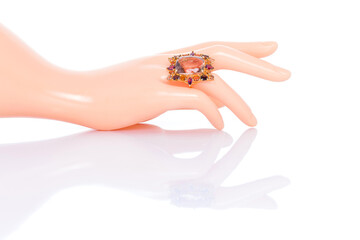Citrine and Tourmaline Jewel or gems ring on plastic mannequin female finger. Collection of natural gemstones accessories. Studio shot
