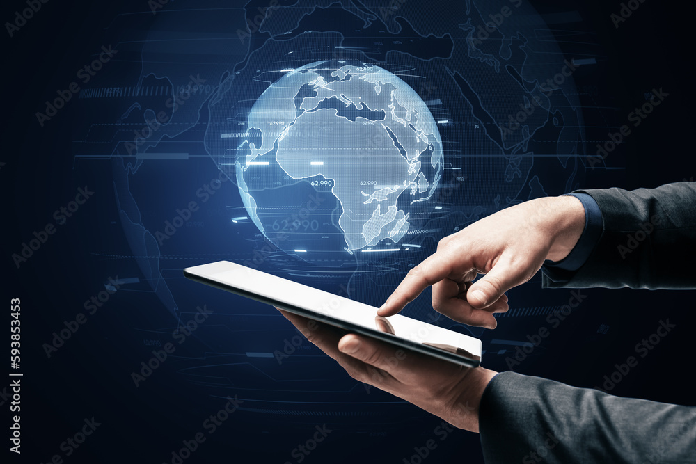 Poster Close up of male hand using cellphone with glowing index globe hologram on dark background. Digital world and matrix concept.