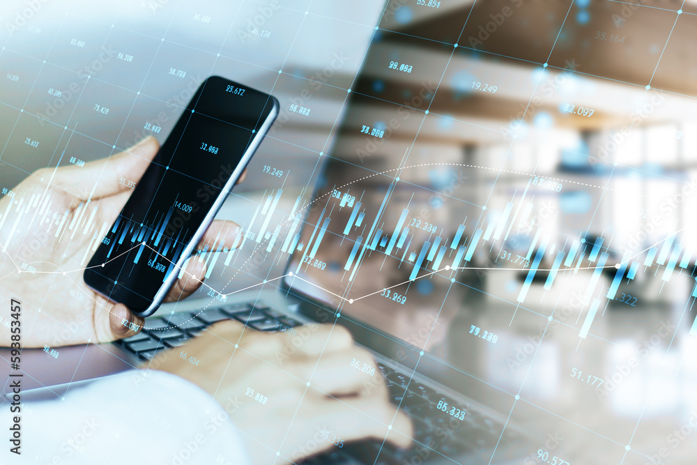 Poster close up of hands using laptop keyboard and mobile phone with glowing candlestick forex chart and in