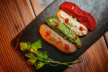 Pkhali with greens on a tray