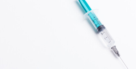 Disposable plastic syringe prepared for injection and vaccination in the hospital. The concept of medicine and health