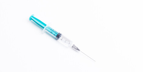 Fototapeta premium medical syringe on a white background