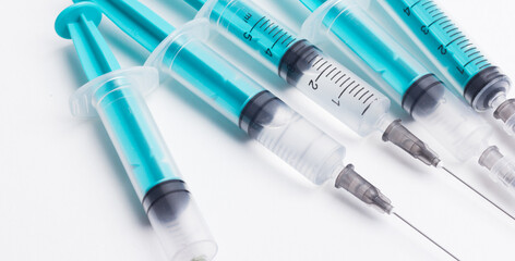 Disposable plastic syringe prepared for injection and vaccination in the hospital. The concept of medicine and health