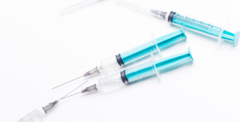 Disposable plastic syringe prepared for injection and vaccination in the hospital. The concept of medicine and health