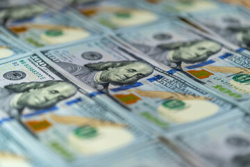 Obraz na płótnie Canvas Pile of new design US dollar bills as background.