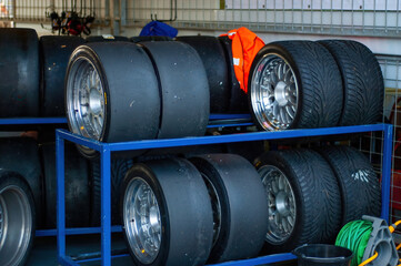 Stack of racing tires prepared in box  to be mounted on racing car