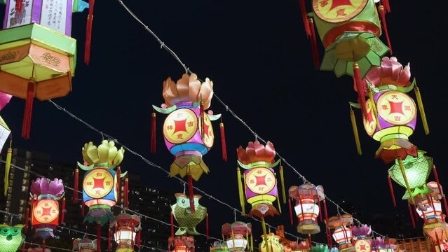 Chinese colorful lanterns, which symbolize prosperity and good fortune, hang from a wire during the Mid-Autumn Festival, also called Mooncake Festival.