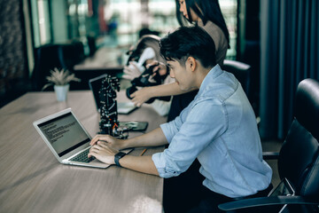 An interning college student sharpened his writing skills in preparing for coding robotic software....