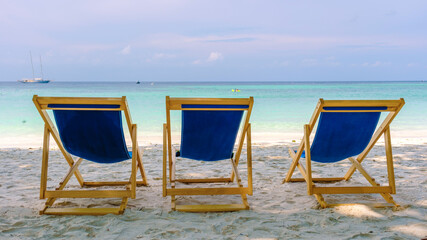 beach chairs at the beach of Koh Kradan island in Thailand