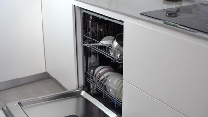 Modern dishwasher open, technology, kitchen.