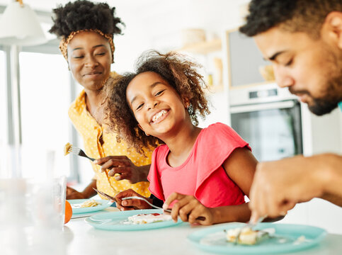 family child kitchen food daughter mother love eating preparing pancake breakfast happy together black dessert