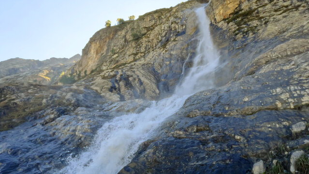 pretty mountain ridge highland fast waterfall at summer day - photo of nature