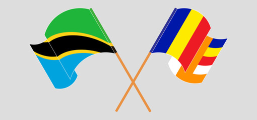 Crossed and waving flags of Tanzania and Buddhism