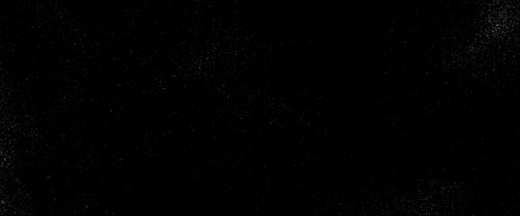 Abstract splashes of water on black background. Freeze motion of white particles, abstract splashes of milk on a black background, dust overlay textured. Grain noise particles. Snow effects pack.