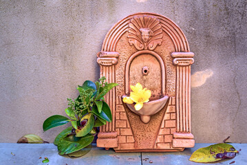 The terracotta fountain in the garden