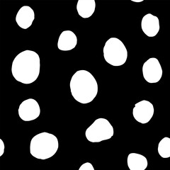 Seamless neutral polka dots pattern. White hand-drawn big circles on Black background. Abstract Random points ornament. Vector simple illustration for wallpaper, fabric, print, wrapping paper, textile