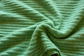 green knitted fabric sweaters