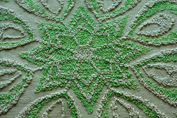 texture of a towel, a green flower close-up