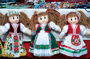 Hand made dolls dressed in romanian traditional folk costumes.