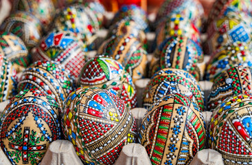 Obraz premium Colorful hand painted decorated Easter eggs. Romanian traditional decoration.