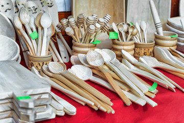 Traditional romanian hand made wooden spoons on display for sale.