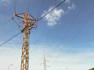 Electric power tower on the outskirts of the city. Copy space.