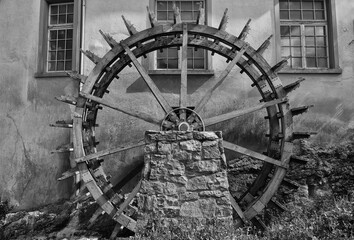 Fototapeta na wymiar Swiss watermill , water wheel detail