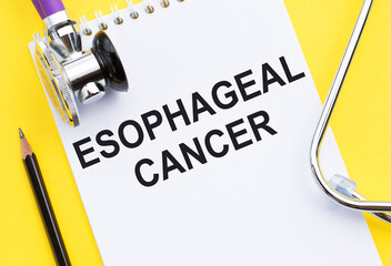 Esophageal Cancer write on a book isolated on office desk.