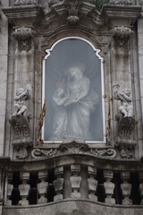 Religious sculpture on the facade of a temple - 593916277