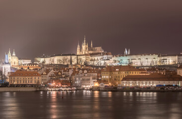 Obraz premium Night and Vltave river, Castle of Prague, St. Vitus Cathedral, Palace and Church. Long Exposure. Prague, Czech.