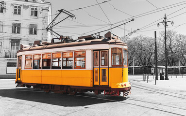 Traditional yellow tram, funicular on the street in Lisbon- travel,  tourism,  vacation in Portugal