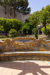 Cloister Santa Chiara with octagonal columns decorated with majolica tiles in rococo style, Naples,...